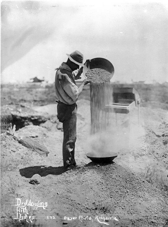 Old Time Gold Prospector Dry Panning for Gold